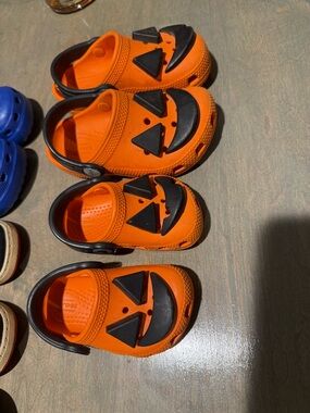 Kids Orange Pumpkin Face Croc Shoes sibling bundle